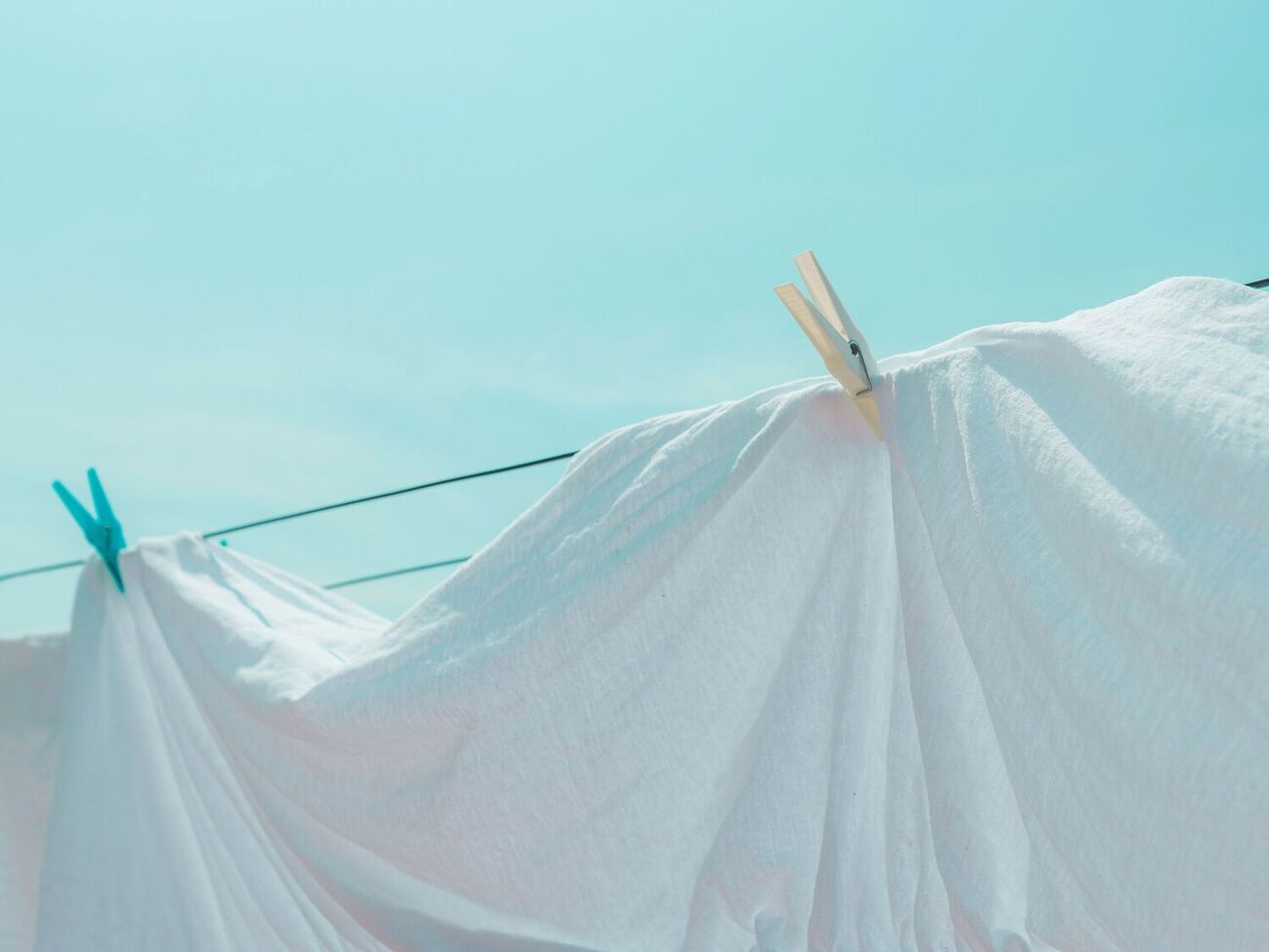 Белье желательно сушить на улице