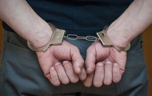 Одного із затриманих доправили у відділок поліції за нібито екстремістську символіку