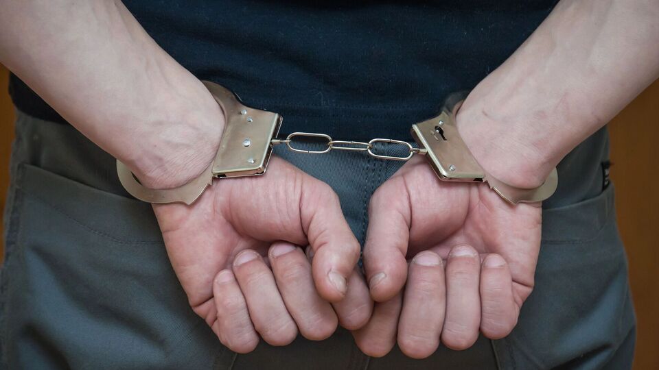 Одного із затриманих доправили у відділок поліції за нібито екстремістську символіку