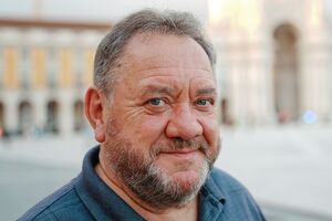 Бенюк родился в 1957 году