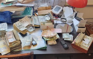 Сотрудники СБУ задокументировали более 20 фактов передачи взяток организаторам схемы по уклонению от службы