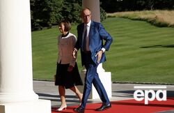 Мерц прийшов на саміт зі спортивним подарунком Трампу. Що приніс?